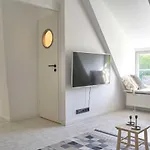 Reetdachhaus De Ole Kaat Сasa de vacaciones Niesgrau